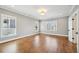 Spacious bedroom featuring hardwood floors, ample natural light, and neutral walls at 970 Drewry Ne St, Atlanta, GA 30306
