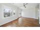 Spacious bedroom featuring hardwood floors, ceiling fan and windows letting in plenty of light at 970 Drewry Ne St, Atlanta, GA 30306