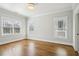 Spacious, bright bedroom featuring hardwood floors and ample natural light at 970 Drewry Ne St, Atlanta, GA 30306