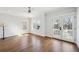 Bedroom with hardwood floors, fan and french doors with a view to the outdoor balcony at 970 Drewry Ne St, Atlanta, GA 30306