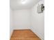 An empty, well-lit closet space with hardwood floors and white walls at 970 Drewry Ne St, Atlanta, GA 30306