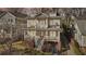 Attractive two-story home with a porch, second story balcony, well-manicured landscaping, and mature trees at 970 Drewry Ne St, Atlanta, GA 30306