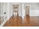 Hallway featuring hardwood floors, and multiple doorways showcasing the home's layout at 970 Drewry Ne St, Atlanta, GA 30306