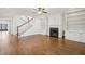 Spacious living room featuring a fireplace with custom built-ins and elegant hardwood flooring at 970 Drewry Ne St, Atlanta, GA 30306