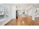 Bright open living area and kitchen, with views of the staircase and outside at 970 Drewry Ne St, Atlanta, GA 30306