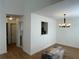 Dining area showcasing a modern chandelier, hardwood floors, and neutral paint at 1039 Whitfield Se Ct, Smyrna, GA 30080