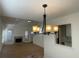 Beautifully lit living room with hardwood floors, a fireplace, and an elegant chandelier at 1039 Whitfield Se Ct, Smyrna, GA 30080