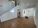 Bright living room featuring hardwood floors, white walls, and a staircase to the second floor at 1039 Whitfield Se Ct, Smyrna, GA 30080