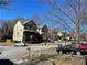 Charming neighborhood street view with well-maintained homes, mature trees and parked cars at 1039 Whitfield Se Ct, Smyrna, GA 30080