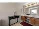 Bathroom vanity with double sinks, and a large mirror at 1267 Huntington Place Cir, Lithonia, GA 30058