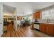 Open kitchen showcasing ample cabinet space and a view into the adjacent dining area at 1267 Huntington Place Cir, Lithonia, GA 30058