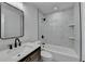 This bathroom features a black framed mirror and a black shower head and other black hardware at 2767 3Rd Sw Ave, Atlanta, GA 30315