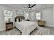 Bright bedroom features a ceiling fan, neutral walls, and a decorative rug at 2767 3Rd Sw Ave, Atlanta, GA 30315