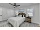 Bright bedroom features a ceiling fan, neutral walls, and a decorative rug at 2767 3Rd Sw Ave, Atlanta, GA 30315