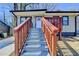 Eye level exterior of home with blue trimmed windows and wooden porch at 2767 3Rd Sw Ave, Atlanta, GA 30315