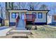 Exterior of home with blue trimmed windows and wooden porch at 2767 3Rd Sw Ave, Atlanta, GA 30315