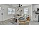 Cozy living room featuring neutral furnishings, wood floors and modern lighting at 2767 3Rd Sw Ave, Atlanta, GA 30315