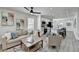 Open living room featuring modern decor, ceiling fan, and seamless flow into the kitchen at 2767 3Rd Sw Ave, Atlanta, GA 30315