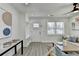 Bright living room with wood floors, recessed lighting and a large window at 2767 3Rd Sw Ave, Atlanta, GA 30315