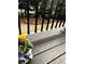 Close-up of back deck features vibrant flowers, decorative rocks, and a peaceful view of the backyard at 2813 Long Grove Ct, Marietta, GA 30062