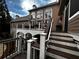 Elevated back deck features comfortable seating, a grill, and steps down to the landscaped yard at 2813 Long Grove Ct, Marietta, GA 30062