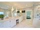 Elegant bathroom with white cabinets, marble floors, and a seamless glass shower at 2813 Long Grove Ct, Marietta, GA 30062