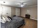 Large bedroom featuring neutral colors, carpet flooring and a modern ceiling fan at 2813 Long Grove Ct, Marietta, GA 30062