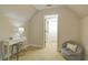 Bedroom features an attic ceiling, a gray beanbag chair and a desk at 2813 Long Grove Ct, Marietta, GA 30062