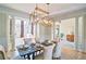 Formal dining room showcasing the architectural columns, and hardwood flooring at 2813 Long Grove Ct, Marietta, GA 30062