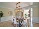 Elegant dining room featuring wainscoting and stylish chandelier lighting over the table setting at 2813 Long Grove Ct, Marietta, GA 30062