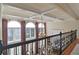 Elegant foyer with coffered ceilings, a decorative chandelier, and large arched windows at 2813 Long Grove Ct, Marietta, GA 30062