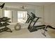 Bright home gym featuring mirrored wall and exercise equipment for a complete workout at 2813 Long Grove Ct, Marietta, GA 30062