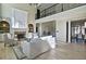 Open-concept living room highlighting the fireplace and view to the dining area at 2813 Long Grove Ct, Marietta, GA 30062