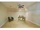 Attic office space with neutral paint, a ceiling fan, and a simple desk setup at 2813 Long Grove Ct, Marietta, GA 30062