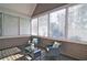 Comfortable sunroom featuring neutral tones and multiple windows providing ample natural light at 2813 Long Grove Ct, Marietta, GA 30062