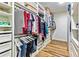 Organized walk-in closet with custom shelving and ample storage space at 650 New Morn Dr, Hampton, GA 30228