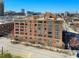 Elevated outdoor perspective of the building showing proximity to other developments and local amenities at 115 W Peachtree Nw Pl # 602, Atlanta, GA 30313