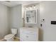 Bathroom featuring a white vanity with marble countertop, new fixtures, and updated lighting at 115 W Peachtree Nw Pl # 602, Atlanta, GA 30313