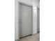 Apartment door with visible unit number and modern design, set in a neutral-toned hallway at 115 W Peachtree Nw Pl # 602, Atlanta, GA 30313