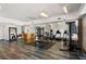 Spacious gym with workout machines, free weights, and bar for healthy lifestyle at 115 W Peachtree Nw Pl # 602, Atlanta, GA 30313