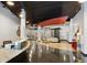 Modern building lobby with reception desk, seating area, and unique architectural details at 115 W Peachtree Nw Pl # 602, Atlanta, GA 30313