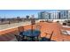 Rooftop patio with stylish outdoor seating, perfect for relaxing and enjoying city views at 115 W Peachtree Nw Pl # 602, Atlanta, GA 30313
