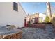 Backyard with a stone patio, outdoor kitchen, and view of the house at 255 Maple Nw Ave, Marietta, GA 30064