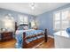 Bedroom with a decorative bedframe, hardwood floors, and natural light at 255 Maple Nw Ave, Marietta, GA 30064