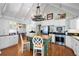 Charming kitchen with white cabinets, a butcher block island, and stainless steel appliances at 255 Maple Nw Ave, Marietta, GA 30064