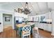 Bright kitchen with stainless steel appliances, white cabinetry, and a center island at 255 Maple Nw Ave, Marietta, GA 30064