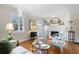 Bright living room with hardwood floors, decorative fireplace and bright natural light at 255 Maple Nw Ave, Marietta, GA 30064