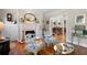 Cozy living room features a fireplace, decorative mirror, and hardwood floors at 255 Maple Nw Ave, Marietta, GA 30064