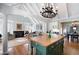 Bright, open living space flowing to a kitchen with an island and adjacent dining area at 255 Maple Nw Ave, Marietta, GA 30064