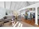 Open-concept living space with vaulted ceilings, hardwood floors, and seamless flow to the kitchen at 255 Maple Nw Ave, Marietta, GA 30064